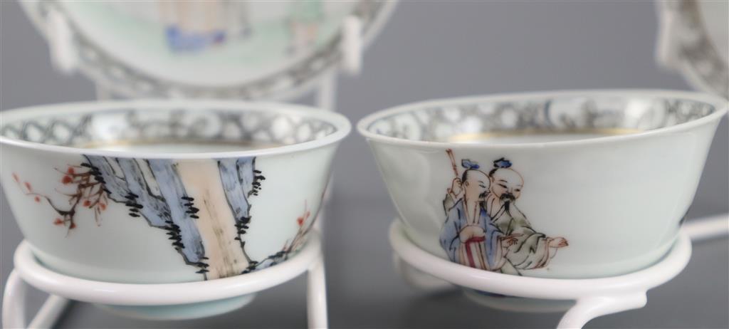 A pair of Chinese famille rose 'sages tea bowls and saucers, Qianlong period, saucers 11.7cm diameter
